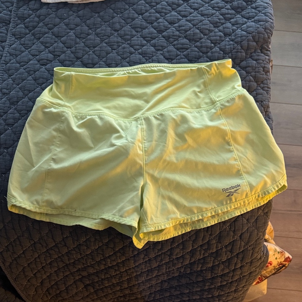 Reebok Women's Light Yellow Athletic Shorts